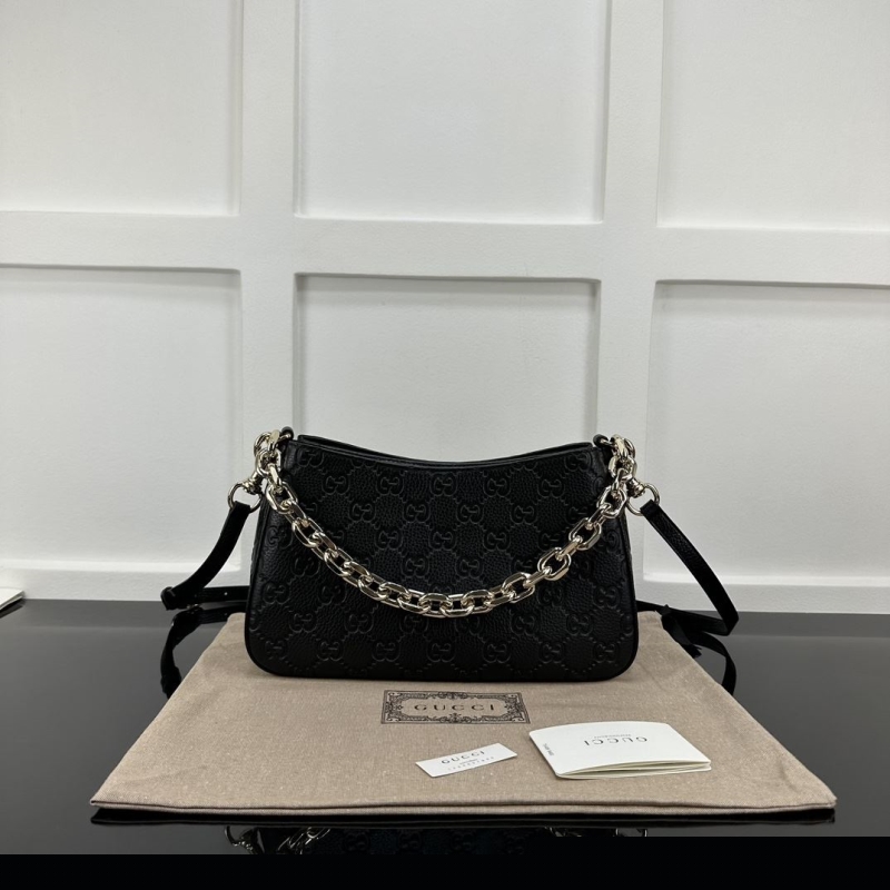 G*u*i satchel bags